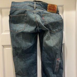 Never worn with tags, Levi’s 23 X 34 Slim Jeans
